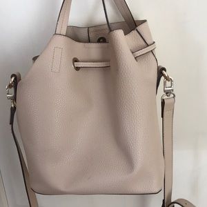 Tan bucket purse. Barely used!
